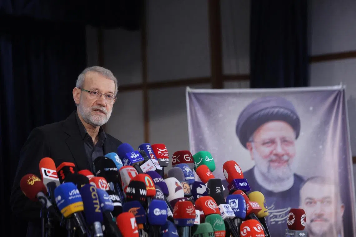 Ali Larijani, former chairman of the parliament of Iran, speaks at a press conference after registering as a candidate for the presidential election at the Interior Ministry, in Tehran, Iran May 31, 2024. Majid Asgaripour/WANA (West Asia News Agency) via REUTERS