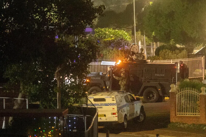 Australian police search the home of a suspect in Bonnyrigg, following a deadly shooting at Bondi Beach in Sydney on Dec 14.