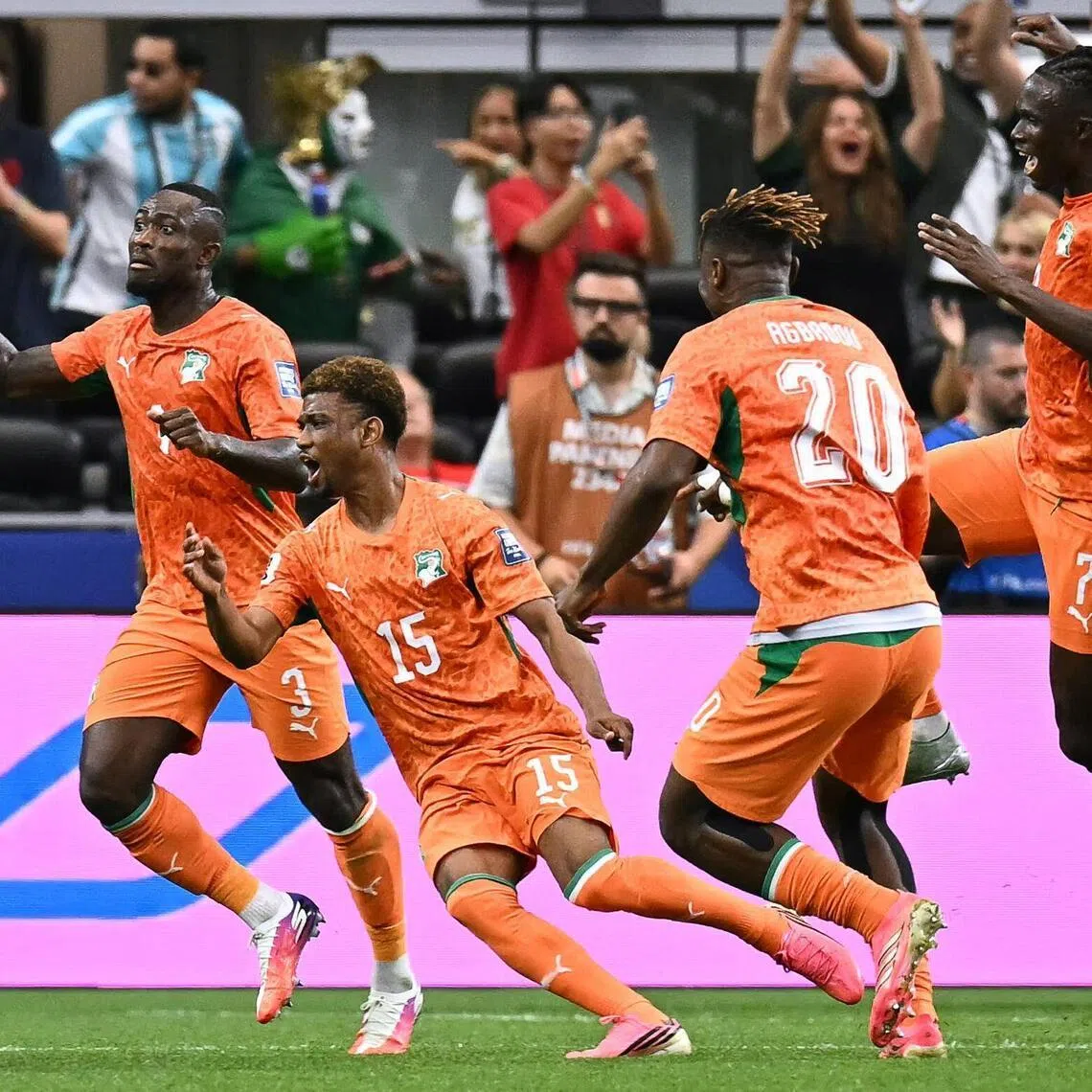 Ivory Coast’s Amad Diallo (second from left) celebrating  after scoring his team’s first goal during their game against Norway on June 30.
