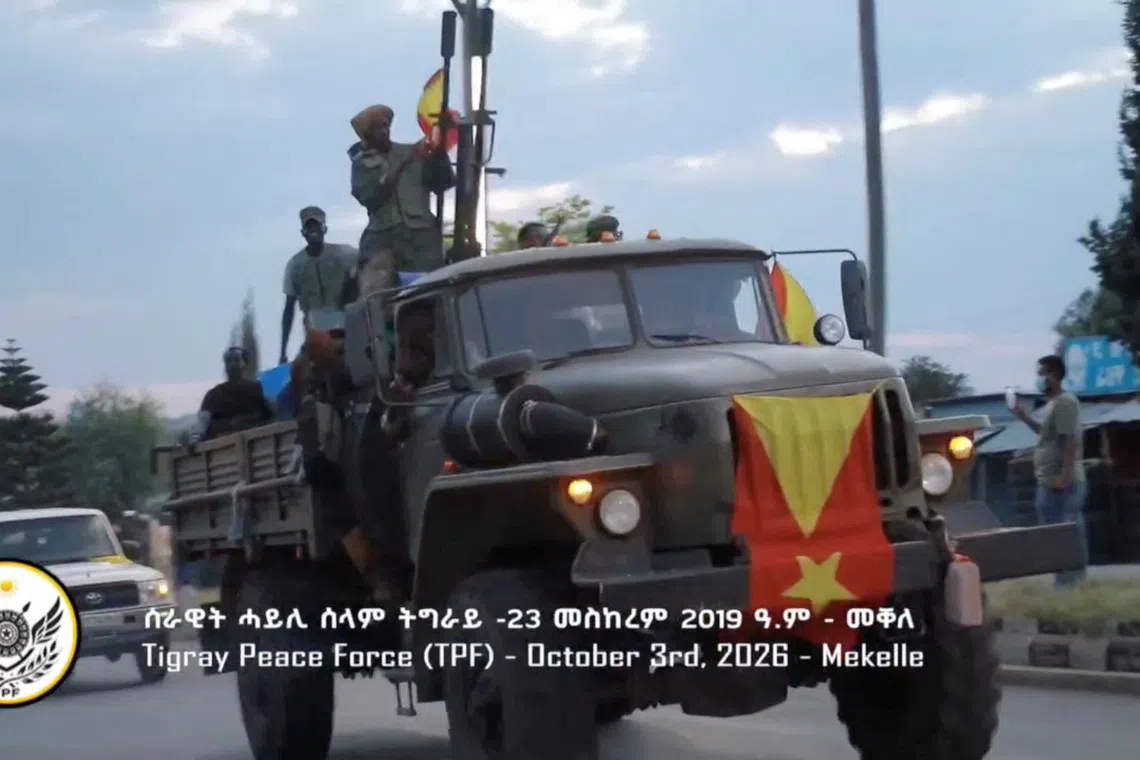 Airstrikes and artillery hit north Ethiopia after Tigray capital's fall, aid sources say