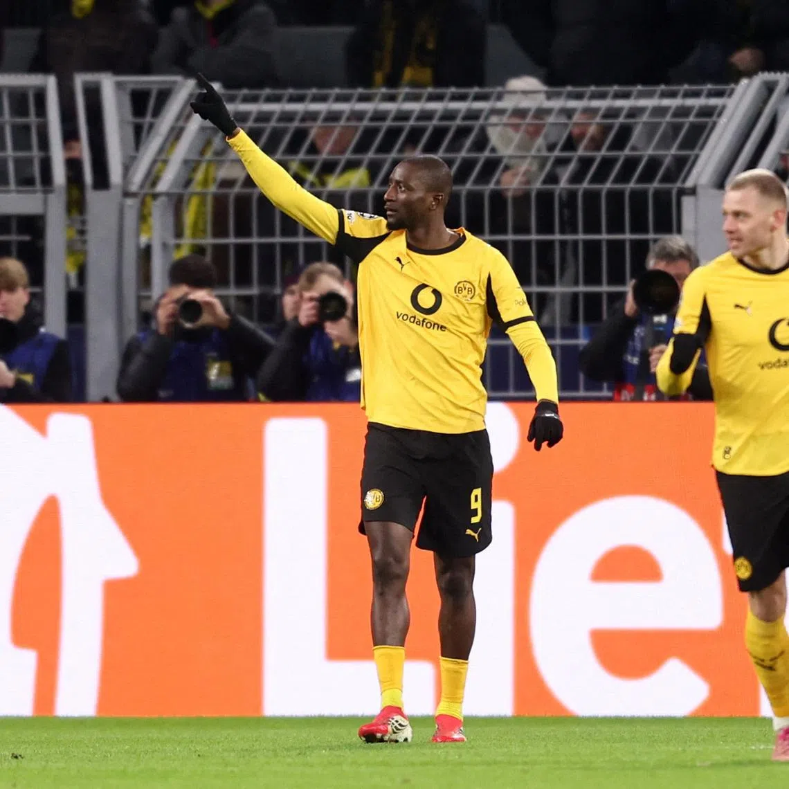 Soccer Football - UEFA Champions League - Play Off - First Leg - Borussia Dortmund v Atalanta - Signal Iduna Park, Dortmund, Germany - February 17, 2026 Borussia Dortmund's Serhou Guirassy celebrates scoring their first goal REUTERS/Leon Kuegeler