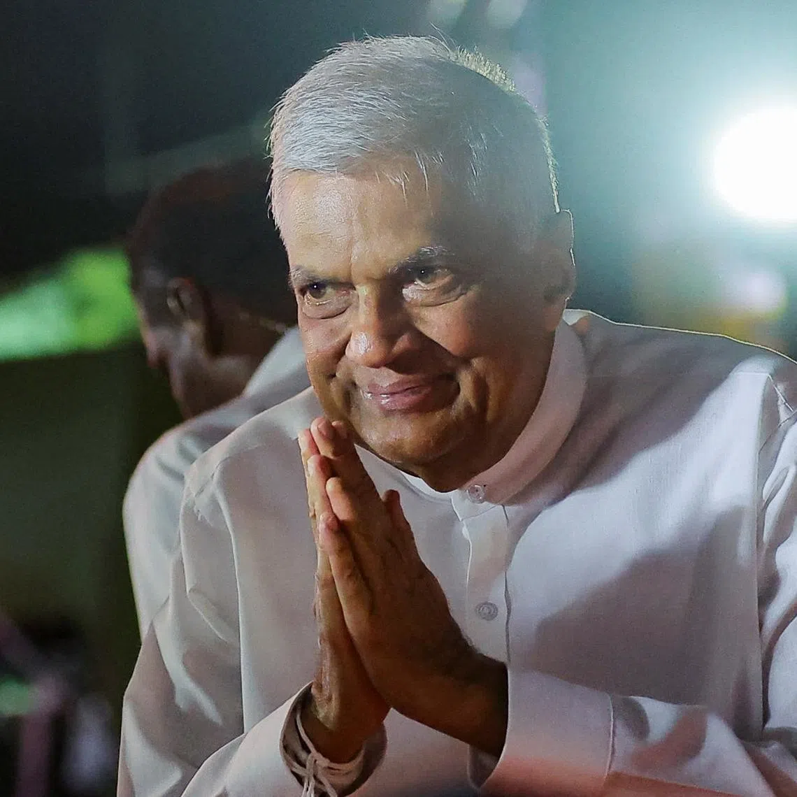FILE PHOTO: Sri Lanka's president Ranil Wickremesinghe gestures as he arrives at his final election campaign rally for the upcoming presidential election, scheduled for September 21, in Colombo, Sri Lanka September 18, 2024. REUTERS/Dinuka Liyanawatte/File Photo