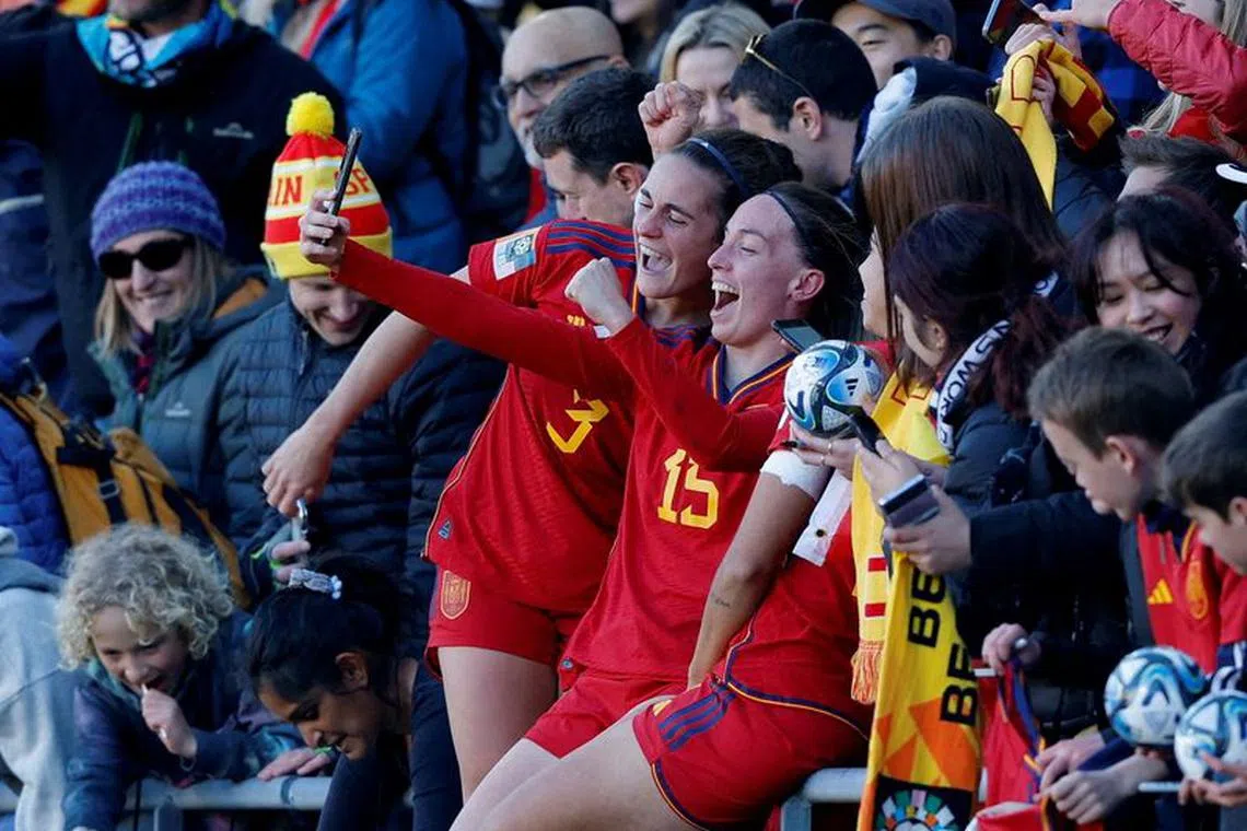 FILE PHOTO: Soccer Football - FIFA Women’s World Cup Australia and New Zealand 2023 - Quarter Final - Spain v Netherlands - Wellington Regional Stadium, Wellington, New Zealand - August 11, 2023 Spain's Teresa Abelleira and Eva Navarro celebrate with fans after progressing to the semi finals of the World Cup REUTERS/Amanda Perobelli/File Photo