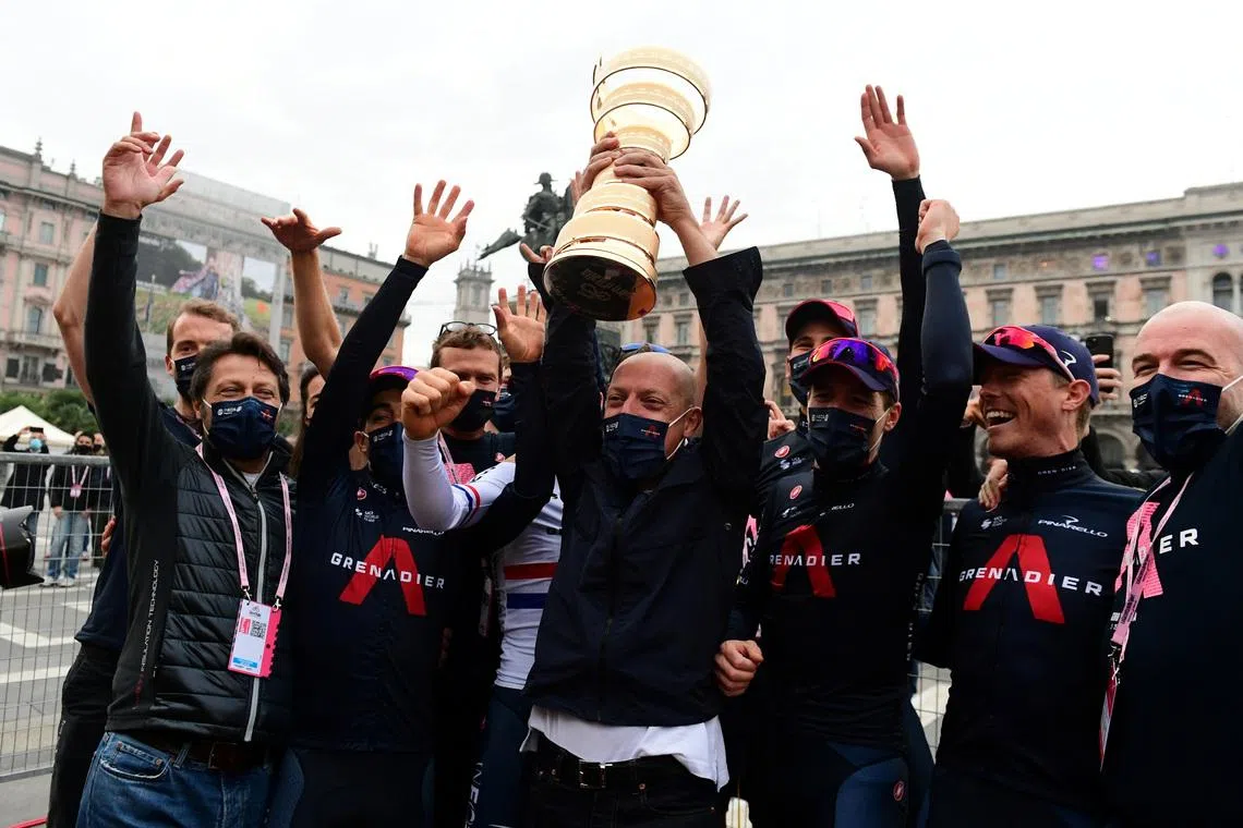Cycling - Giro d'Italia - Stage 21 - Cernusco sul Naviglio to Milan, Italy - October 25, 2020  Dave Brailsford, team manager of Team INEOS celebrates with the trophy REUTERS/Stringer/File Photo