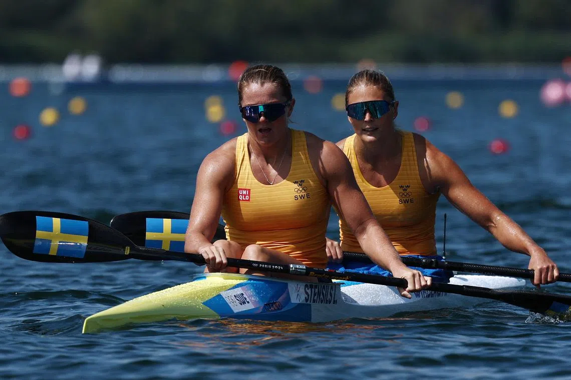 Paris 2024 Olympics - Sprint Canoe - Women's Kayak Double 500m Heats - Vaires-sur-Marne Nautical Stadium - Flatwater, Vaires-sur-Marne, France - August 06, 2024. Linnea Stensils of Sweden and Moa Wikberg of Sweden react. REUTERS/Yara Nardi
