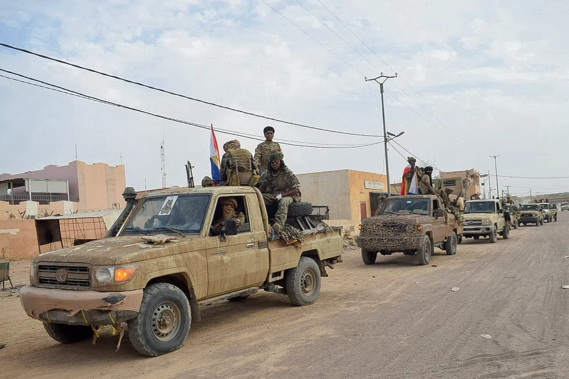 PICTURE TAKEN ON APRIL 27, 2026: Members of the Azawad Liberation Front (FLA) take part in a parade, two days after the group said it had retaken the city of Kidal, Mali, April 27, 2026. Picture taken with a mobile phone. REUTERS/Stringer