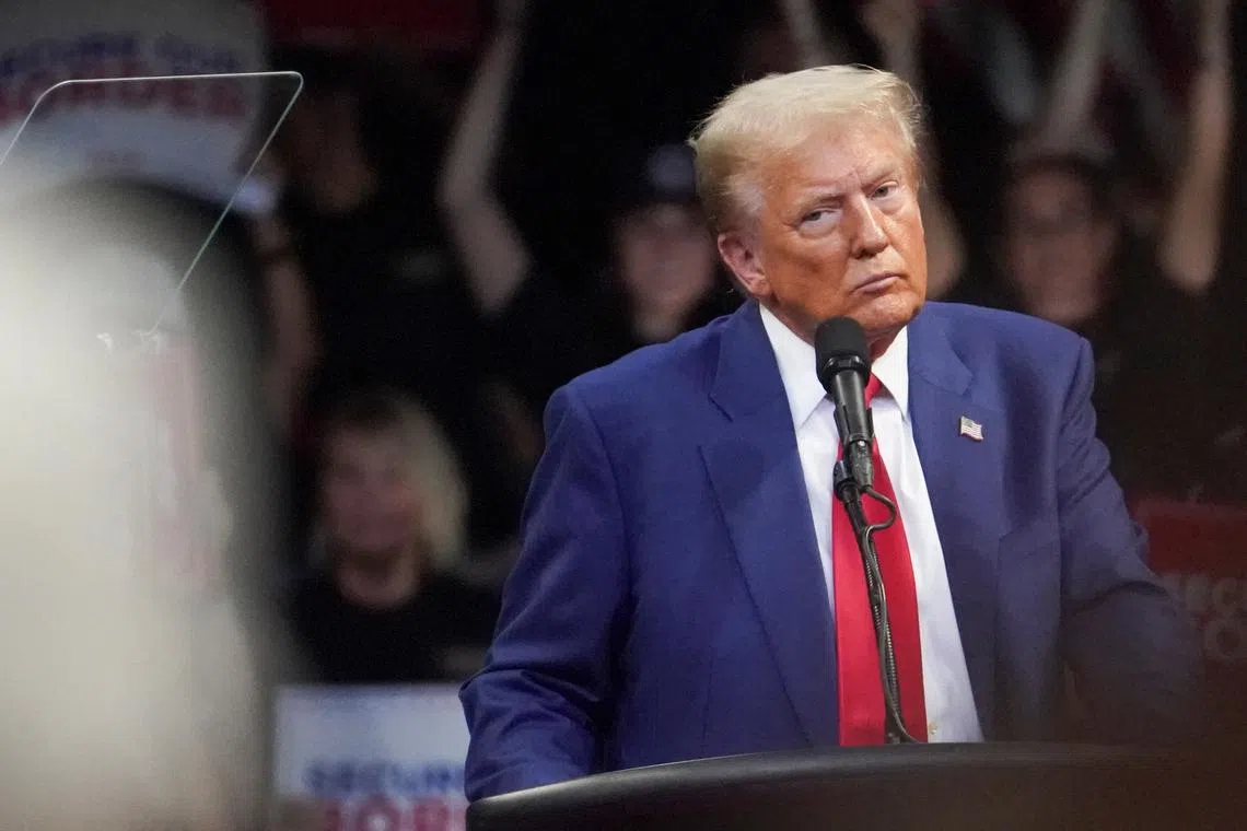 Republican presidential nominee and former U.S. President Donald Trump looks on during a campaign rally in Prescott Valley, Arizona, U.S., October 13, 2024.  REUTERS/Go Nakamura