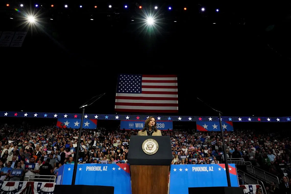 Mr Harris speaks during a campaign rally held in Glendale, Arizona.
