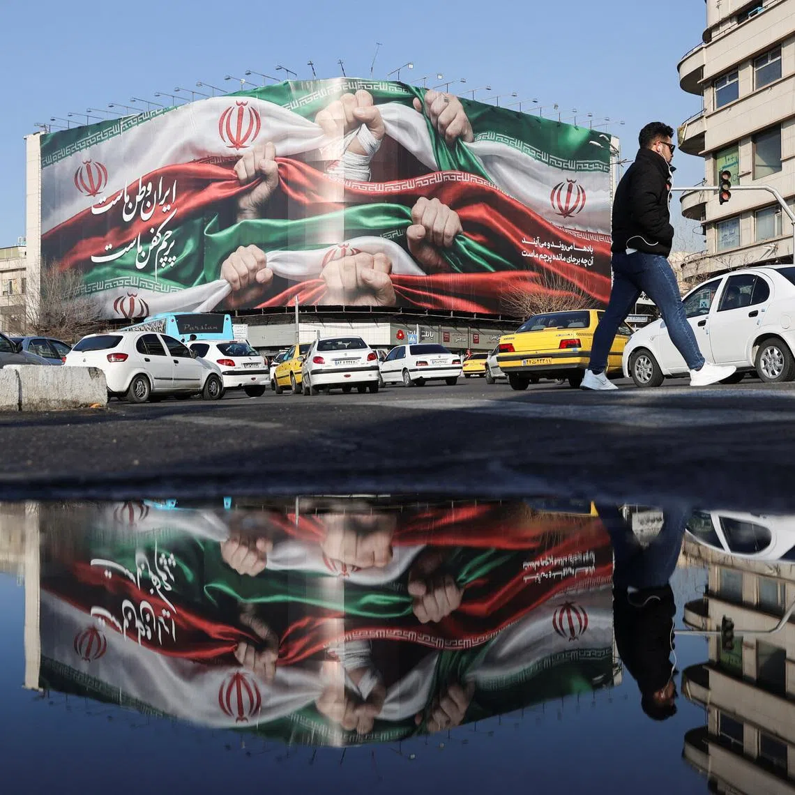 A billboard with a picture of Iran's flag, on a building in Tehran, Iran, January 24, 2026. Majid Asgaripour/WANA (West Asia News Agency) via REUTERS