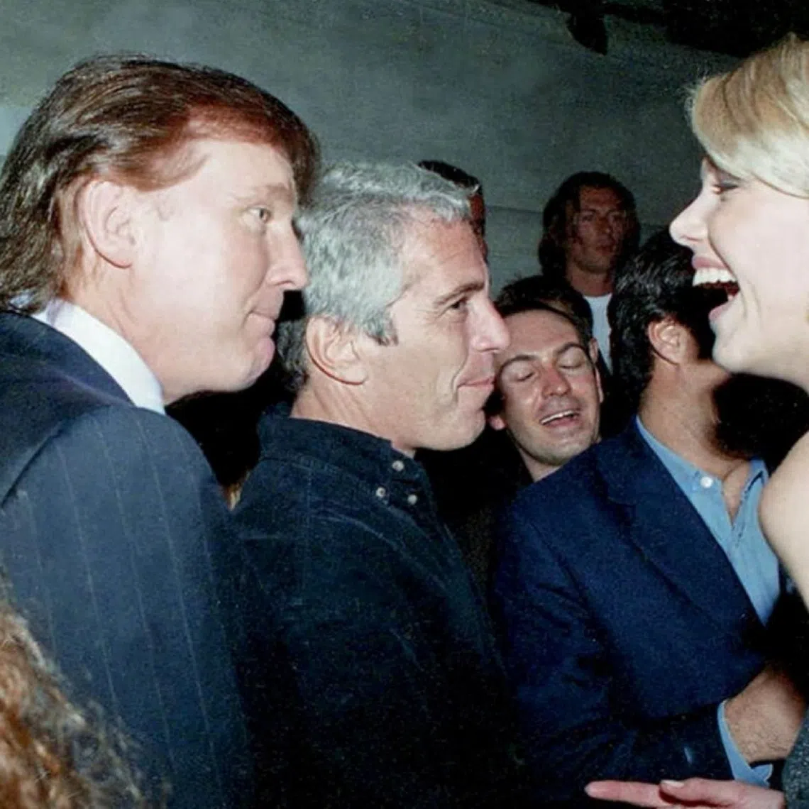 US President Donald Trump (left) and late financier and convicted sex offender Jeffrey Epstein (second from left), in photos released by Democrats sitting on the House Oversight Committee in Washington.
