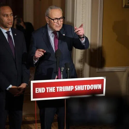 US Senate Minority Leader Senator Chuck Schumer (right) and House Democratic Minority Leader Representative Hakeem Jeffries brief members of the press at the US Capitol on Oct 16.