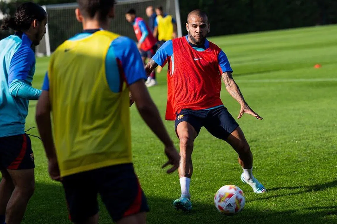 Dani Alves was detained in January after being accused of raping a young woman in the bathroom of a nightclub.