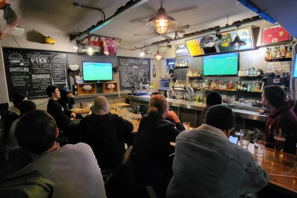 A crowd of about 50 gathered in sports bar The Workshop in Seoul to watch the live telecast of the match between South Korea and Brazil on Dec 6.