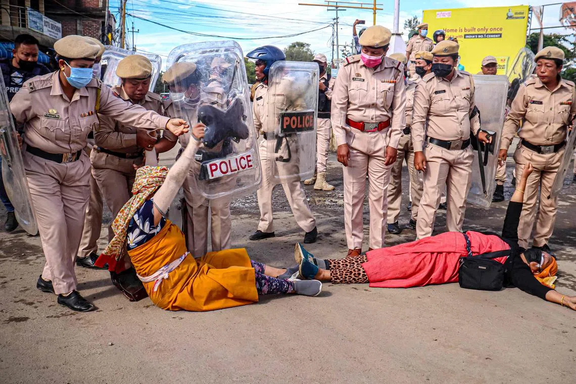 Women protest as they demand restoration of peace in India's northeastern state of Manipur after ethnic violence.
