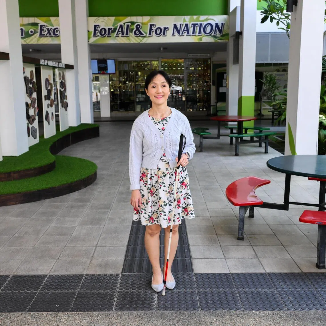 Penny Chong, who is blind, has been a resource teacher coaching visually impaired students at Ahmad Ibrahim Secondary School for nearly 20 years.