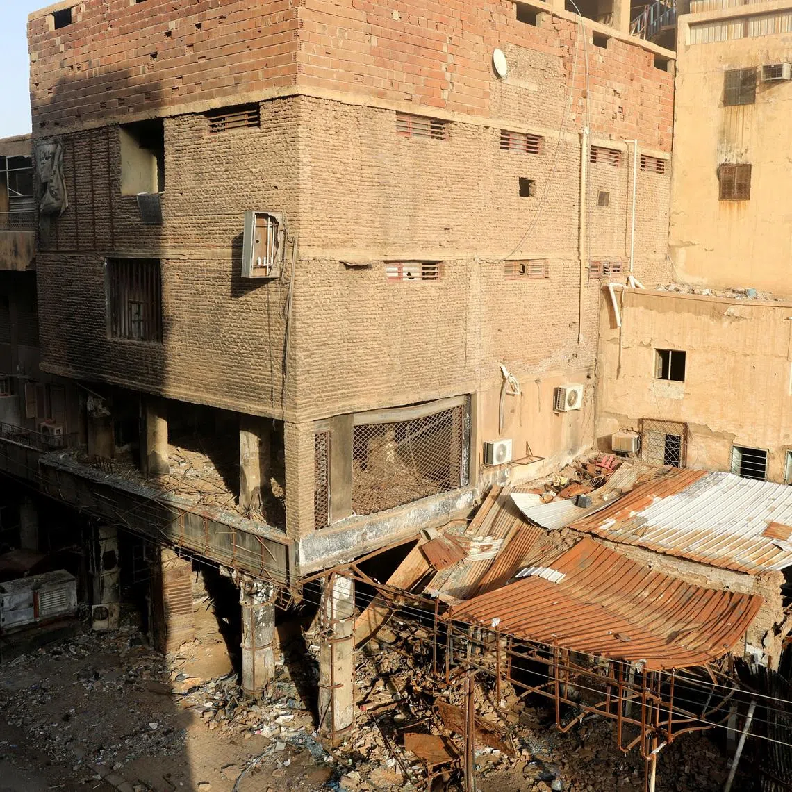 FILE PHOTO: Burnt shops lies down closed in downtown in Khartoum, Sudan June 25, 2026. REUTERS/El Tayeb Siddig/File Photo