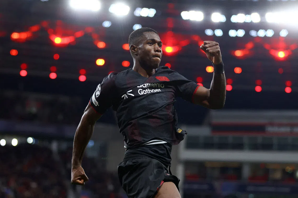 Soccer Football - UEFA Champions League - Bayer Leverkusen v PSV Eindhoven - BayArena, Leverkusen, Germany - October 1, 2025 Bayer Leverkusen's Christian Kofane celebrates scoring their first goal REUTERS/Thilo Schmuelgen