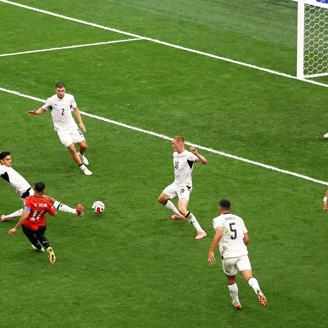 Soccer Football - FIFA World Cup 2026 - Group G - New Zealand v Egypt - BC Place, Vancouver, Canada - June 21, 2026 Egypt's Mohamed Salah scores their second goal past New Zealand's Max Crocombe REUTERS/Lee Smith