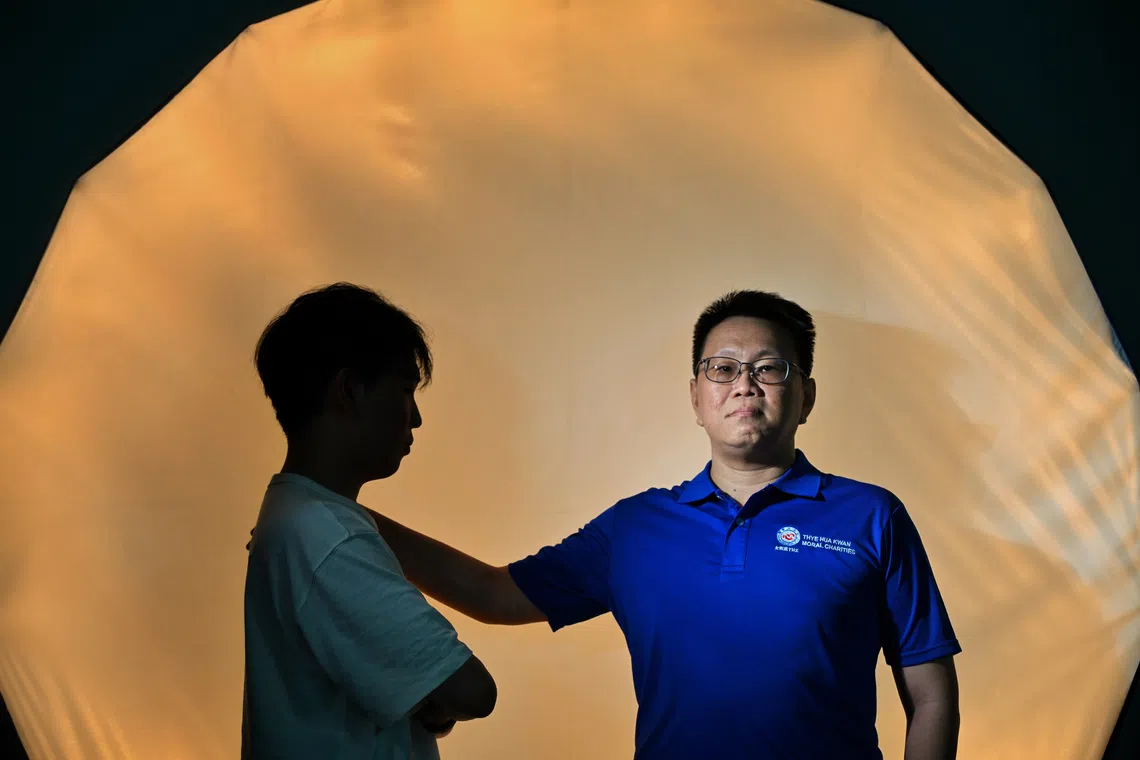 Seah Kek Koon (right), senior social worker at Thye Hua Kwan Moral Charities, counselled Jerome for three months.