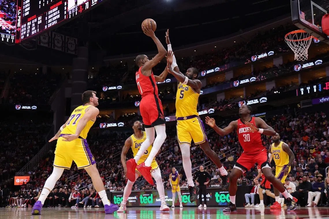 Kevin Durant of the Houston Rockets shoots the ball against Deandre Ayton of the Los Angeles Lakers during the second half at Toyota Center on March 16.