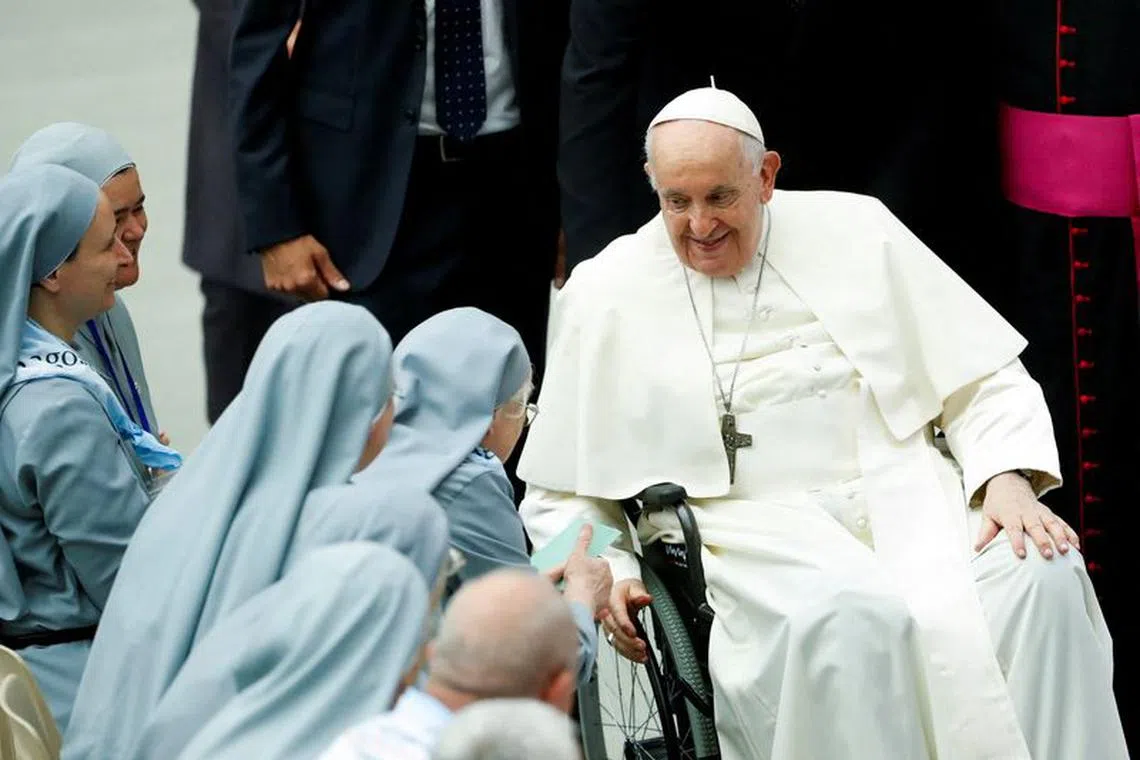 FILE PHOTO: Pope Francis attends a meeting with nuns of Sisters Disciples of Jesus in the Eucharist in Paul VI hall, at the Vatican, August 25, 2023. REUTERS/Remo Casilli/File Photo