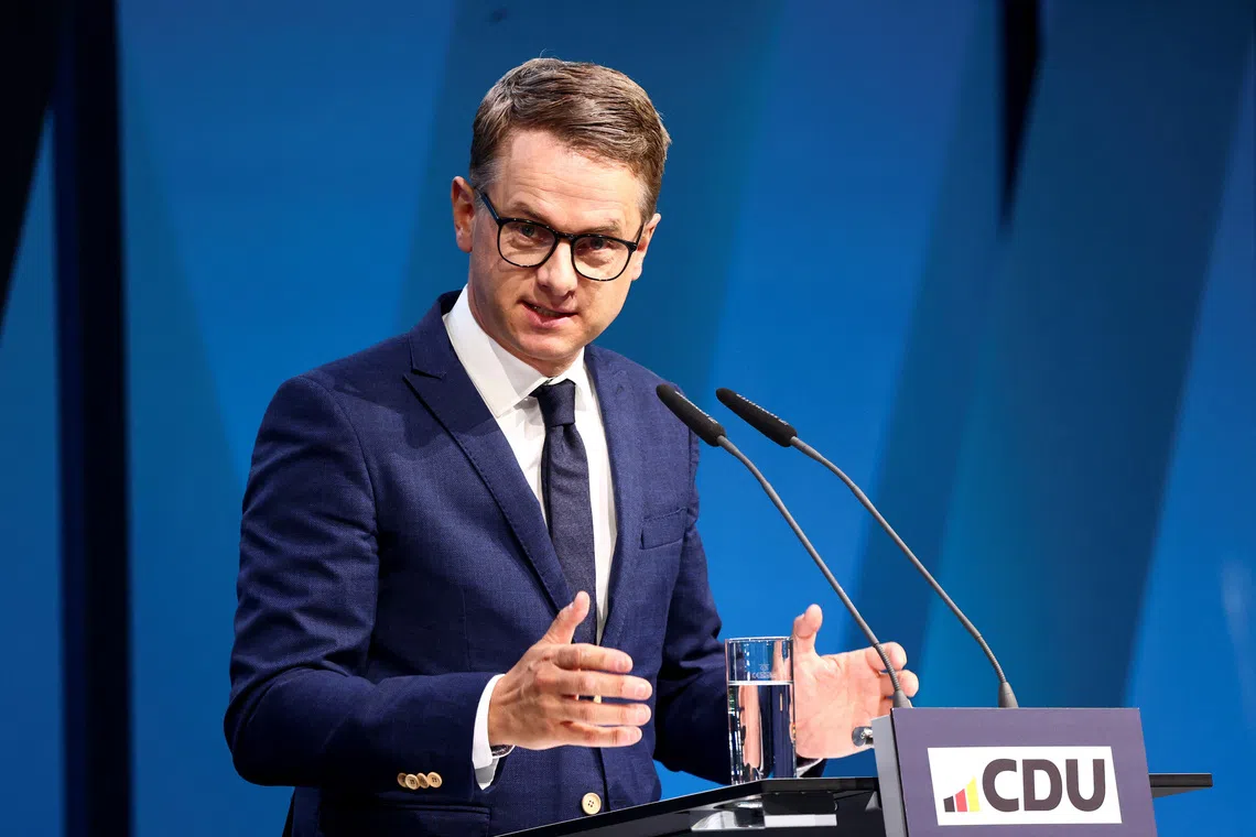 FILE PHOTO: CDU General Secretary Carsten Linnemann speaks during a CDU party conference to formally sign off on a coalition agreement reached with the Social Democrats, in Berlin, Germany April 28, 2025. REUTERS/Liesa Johannssen/File Photo