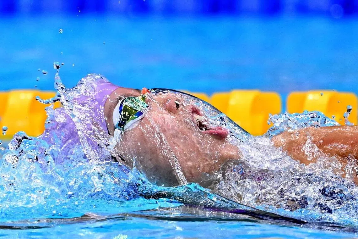 China’s Peng Xuwei wins the women’s 200m backstroke gold and breaks a 16-year-old Asian record in 2min 5.77sec.