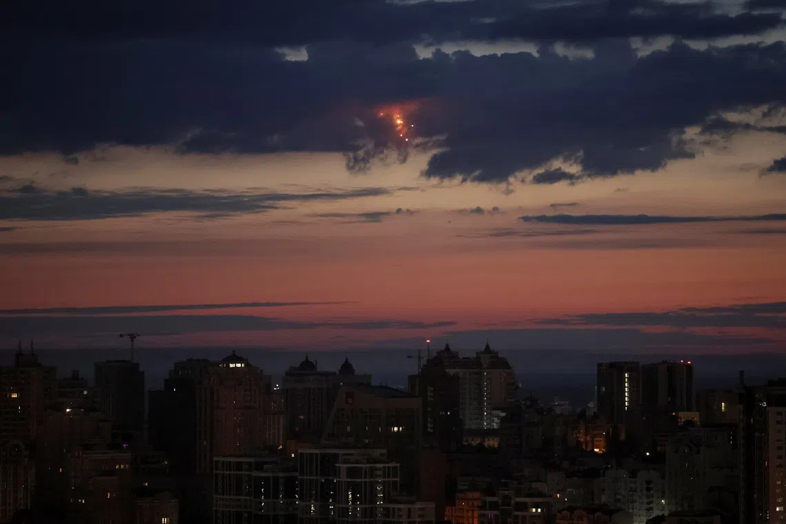 Ukrainian servicemen hit a Russian drone during a Russian missile and drone strike, amid Russia's attack on Ukraine, in Kyiv, Ukraine August 20, 2026. REUTERS/Gleb Garanich