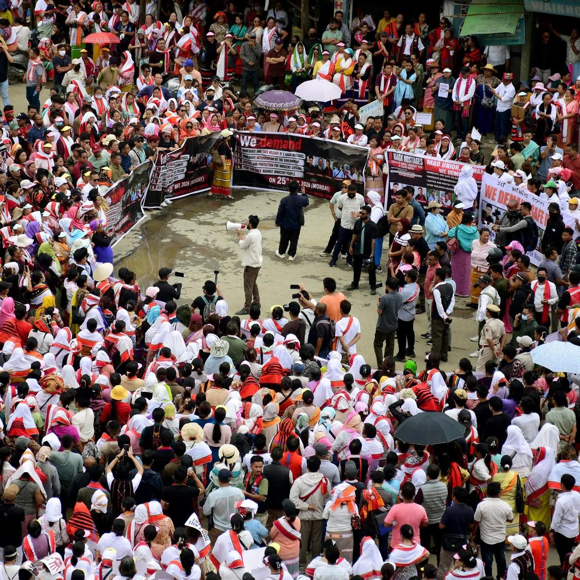 People gather during a protest to demand the release of six Naga men, who according to demonstrators are held by suspected Kuki militants in Kangpokpi district, in Imphal, Manipur, India, May 25, 2026. REUTERS/Stringer