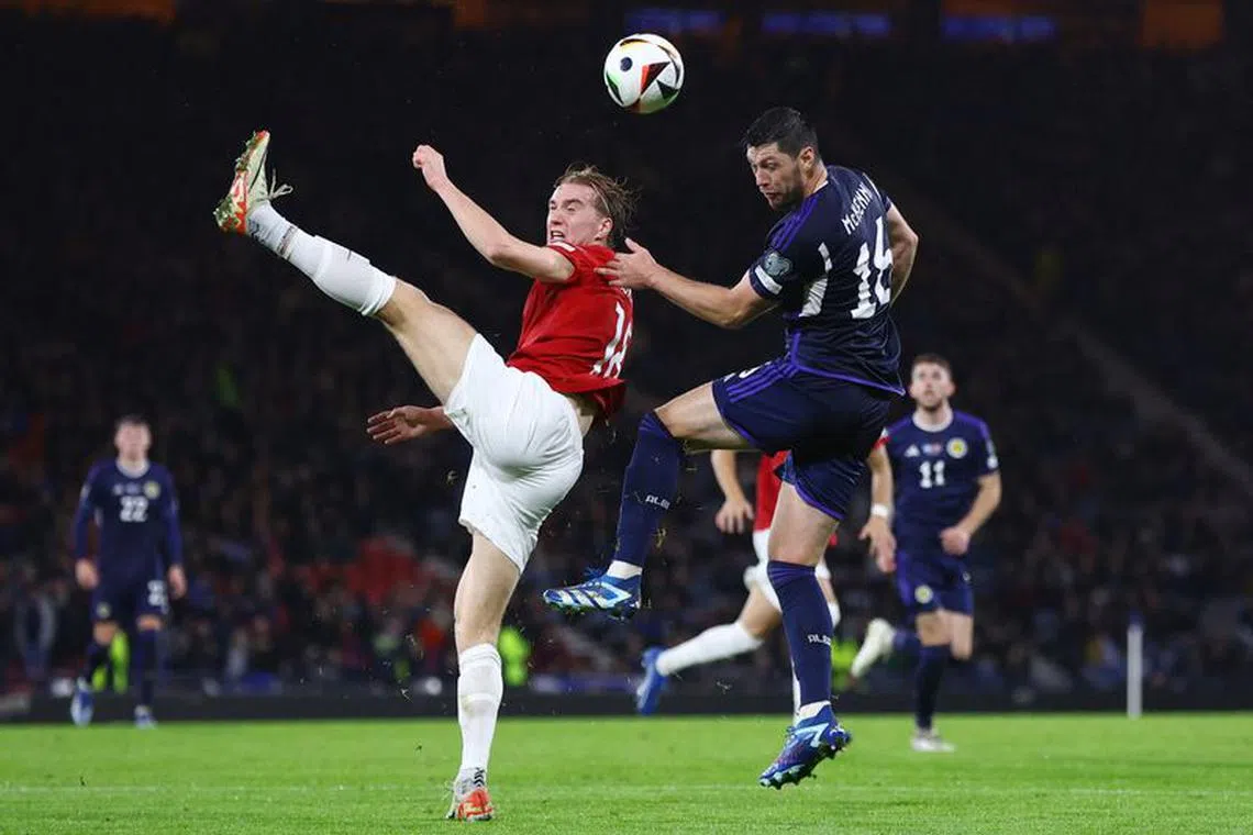 Soccer Football - Euro 2024 Qualifier - Group A - Scotland v Norway - Hampden Park, Glasgow, Scotland, Britain - November 19, 2023 Norway's Kristian Thorstvedt in action with Scotland's Ryan Christie Action Images via Reuters/Lee Smith