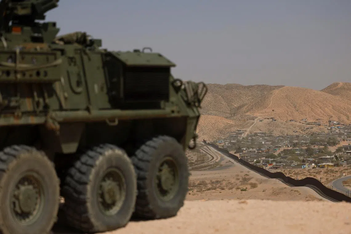 FILE PHOTO: A U.S. Army Stryker armored vehicle is seen near at the U.S.-Mexico border in Sunland Park, New Mexico, U.S., March 28, 2025. REUTERS/Jose Luis Gonzalez/File Photo