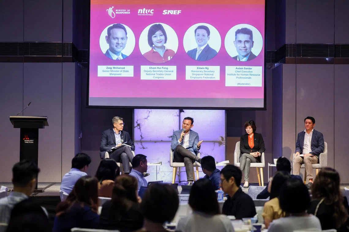 Senior Minister of State for Manpower Zaqy Mohamad (second from left) speaking at the dialogue moderated by Institute for Human Resource Professionals chief executive Aslam Sardar (left). Also on the panel were NTUC deputy secretary-general Cham Hui Fong (second from right) and honorary secretary of the Singapore National Employers Federation Edwin Ng.
