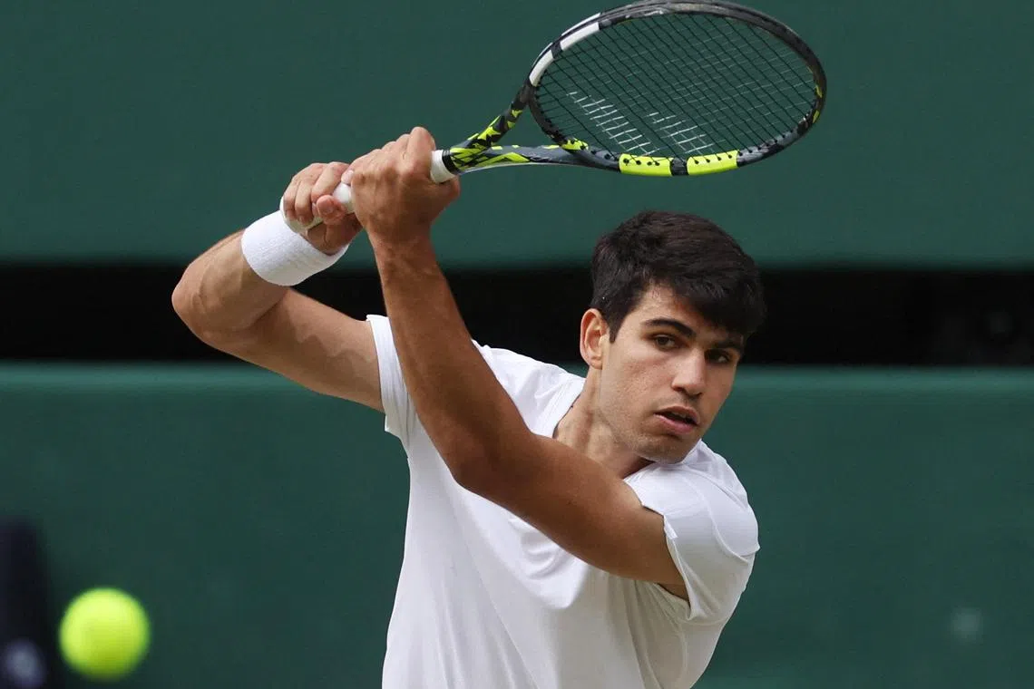Spain's Carlos Alcaraz (above) reaches his second Wimbledon final after defeating Russian Daniil Medvedev 6-7 (1-7), 6-3, 6-4, 6-4 on July 12.