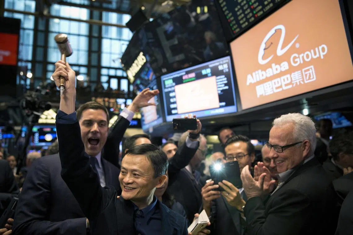 When the opening bell rang on Sept 19, 2014, stock traders cheered, wearing hoodies in Alibaba’s signature orange over their suits.