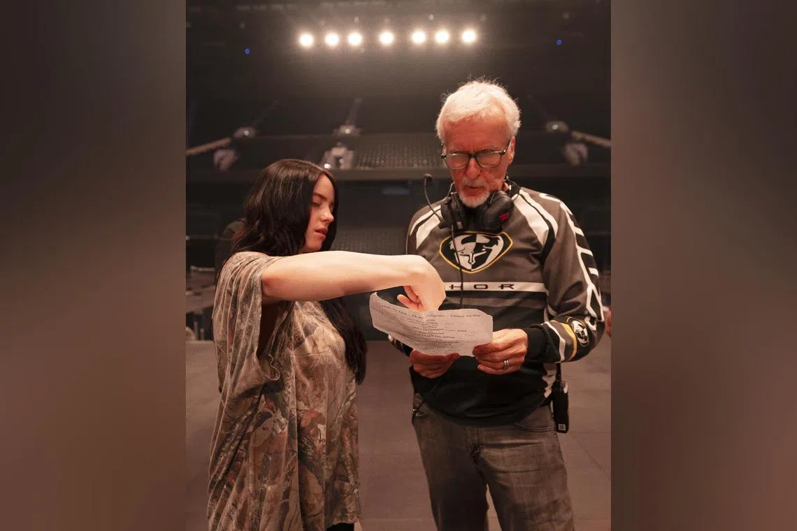 Billie Eilish (left) and James Cameron in a scene from Billie Eilish – Hit Me Hard And Soft: The Tour (Live In 3D).