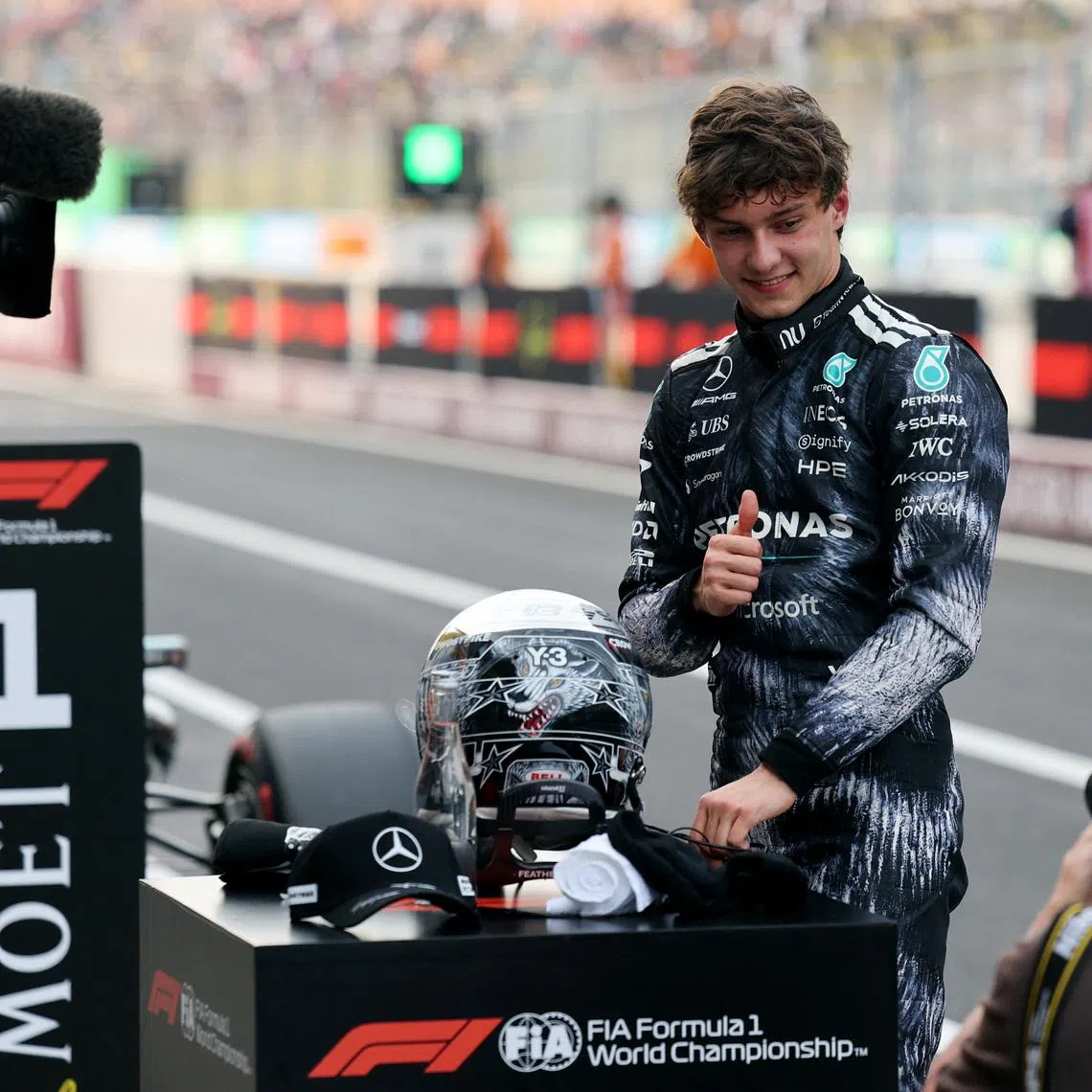 Formula One F1 - Japanese Grand Prix - Suzuka Circuit, Suzuka, Japan - March 28, 2026 Mercedes' Andrea Kimi Antonelli celebrates after qualifying in pole position REUTERS/Issei Kato