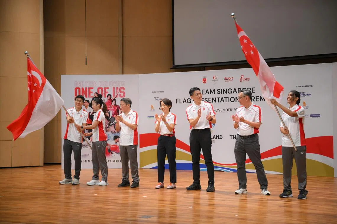 (From left), Singapore flag bearers Noah Lim and Yeo Jiamin, SEA Games chef de mission Lawrence Leow, Singapore National Olympic Council president Grace Fu, Acting Minister for Culture, Community and Youth David Neo, Asean Para Games chef de mission Gary Chong and Singapore flagbearer Joan Hung.