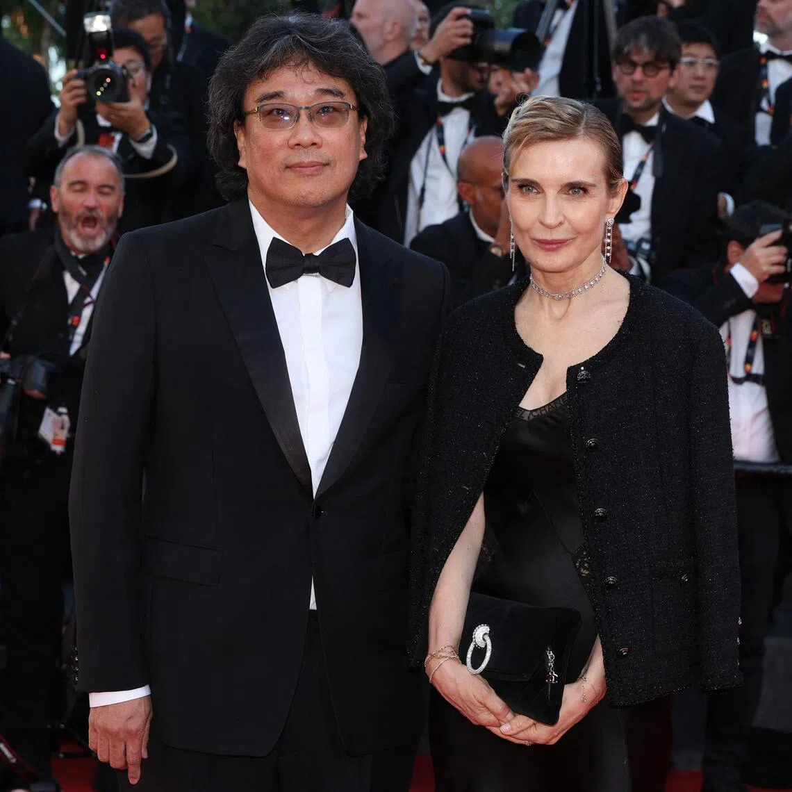 South korean director Bong Joon-Ho and Marrakech festival director Melita Toscan Du Plantier at the Cannes Film Festival in  France.