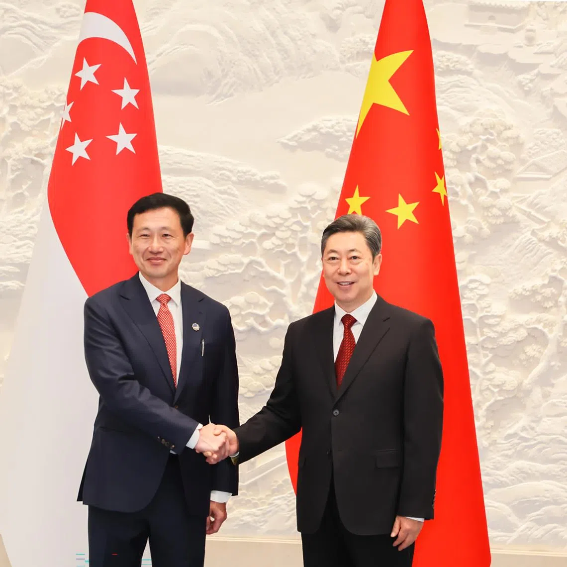 Coordinating Minister for Social Policies Ong Ye Kung (left) with Mr Chen Wenqing, a member of the Communist Party of China’s Politburo, in Hangzhou, on April 20.