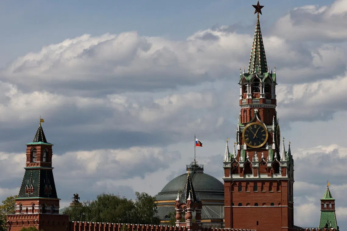 The Russian flag flies on the dome of the Kremlin Senate building behind Spasskaya Tower, in central Moscow, Russia, May 4, 2023. REUTERS/Stringer