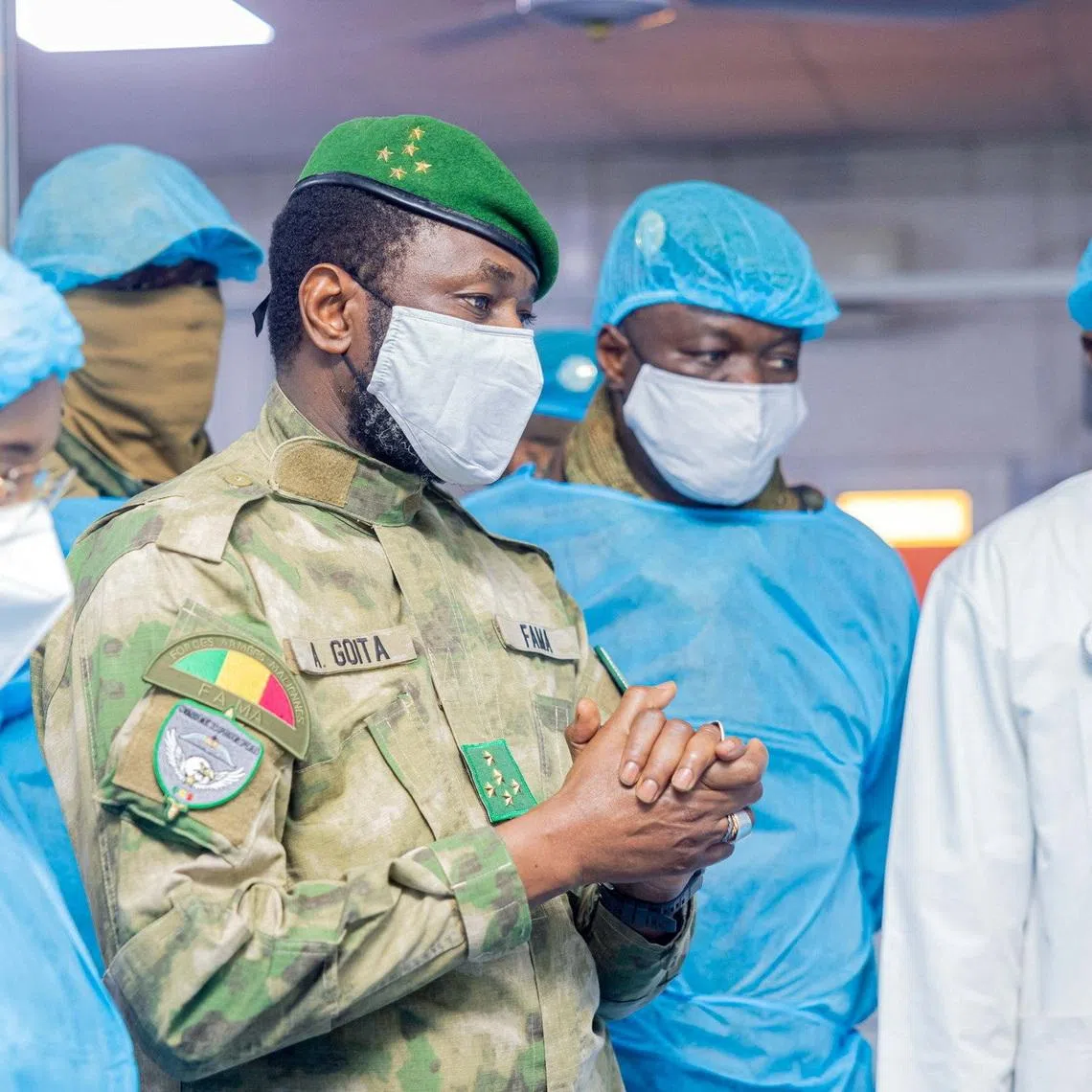 The leader of Mali's military government, Assimi Goita, visits wounded civilians and military personnel in Bamako, Mali, in this handout photo released on April 28, 2026. Mali Presidency via Facebook/Handout via REUTERS