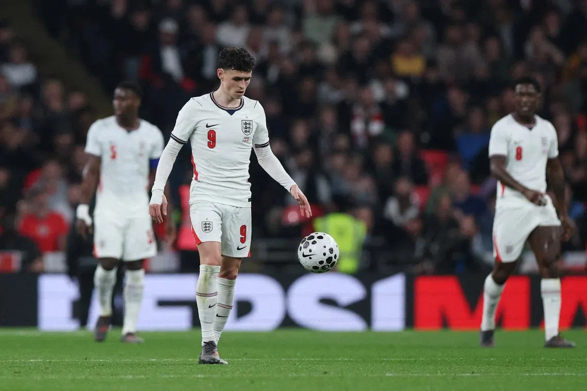 FILE PHOTO: Soccer Football - International Friendly - England v Japan - Wembley Stadium, London, Britain- March 31, 2026  England's Phil Foden looks dejected after Japan's Kaoru Mitoma scores their first goal REUTERS/Isabel Infantes/File Photo