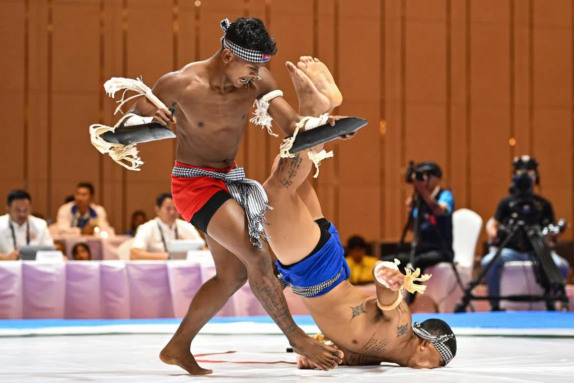 ST20230508-202366475813-Lim Yaohui-jondiary09/
Titsovathanak Kim and Vutha Yim from Cambodia in the Men's Duo Performance in Kun Bokator at Chroy Changvar Convention Center on May 8, 2023. They got the silver medal with a score of 8.4992.
The 2023 Southeast Asian Games, commonly known as the 32nd Southeast Asian Games, or the 32nd SEA Games, and commonly known as Cambodia 2023, will be the 32nd edition of the Southeast Asian Games, a biennial sports multi-sport event which will be held from 5 to 17 May 2023 in Phnom Penh, Cambodia.
(ST PHOTO: LIM YAOHUI)