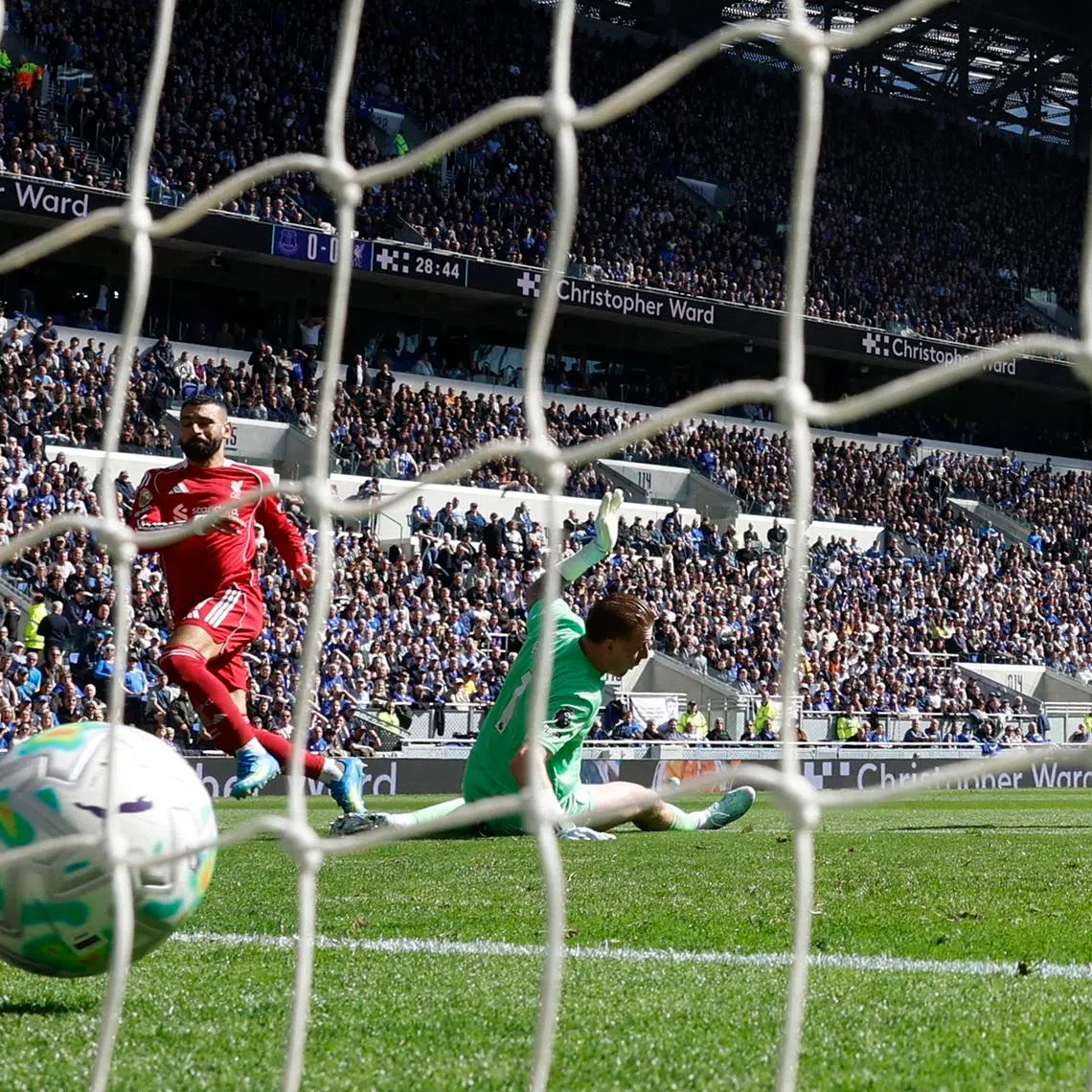 Soccer Football - Premier League - Everton v Liverpool - Hill Dickinson Stadium, Liverpool, Britain - April 19, 2026 Liverpool's Mohamed Salah scores their first goal Action Images via Reuters/Jason Cairnduff