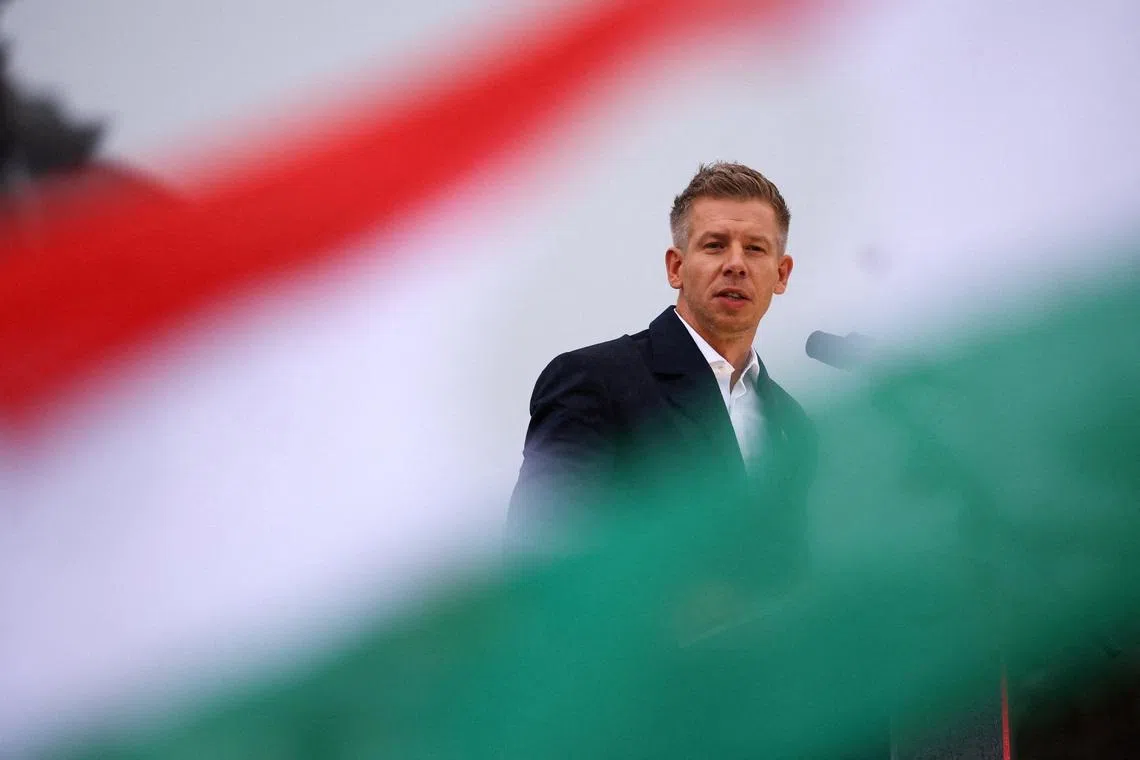 FILE PHOTO: Peter Magyar, leader of the opposition TISZA party, delivers a speech to mark the 69th anniversary of the Hungarian Uprising of 1956, in Budapest, Hungary, October 23, 2025. REUTERS/Bernadett Szabo/File Photo
