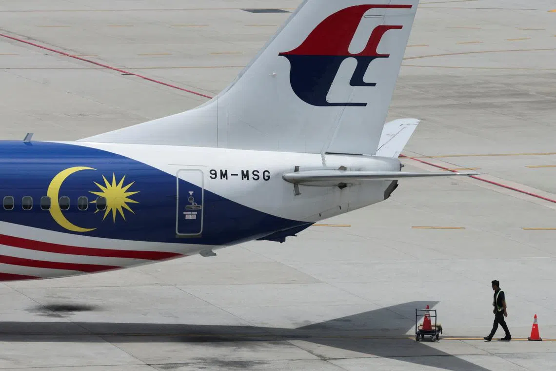 A Malaysia Airlines plane sits on the tarmac at Kuala Lumpur International Airport on Aug 28.
