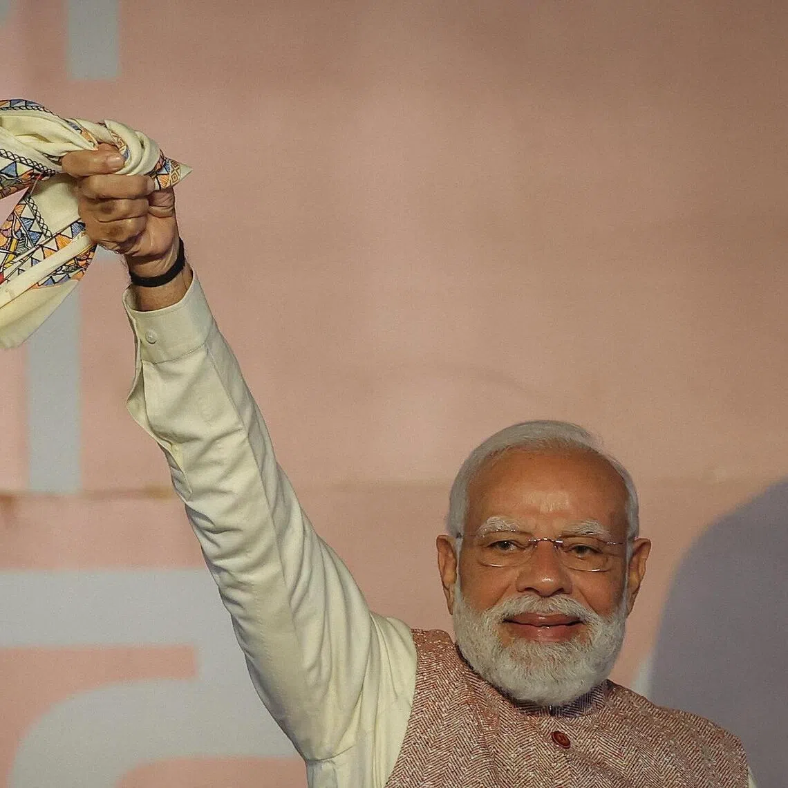 India's Prime Minister Narendra Modi waves as his Bharatiya Janata Party supporters celebrate the Bihar state assembly election results. 