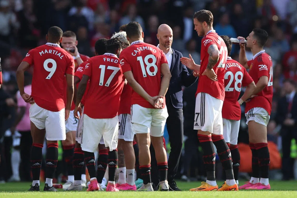 Manchester United manager Erik ten Hag with his players after their final Premier League home match on May 28.