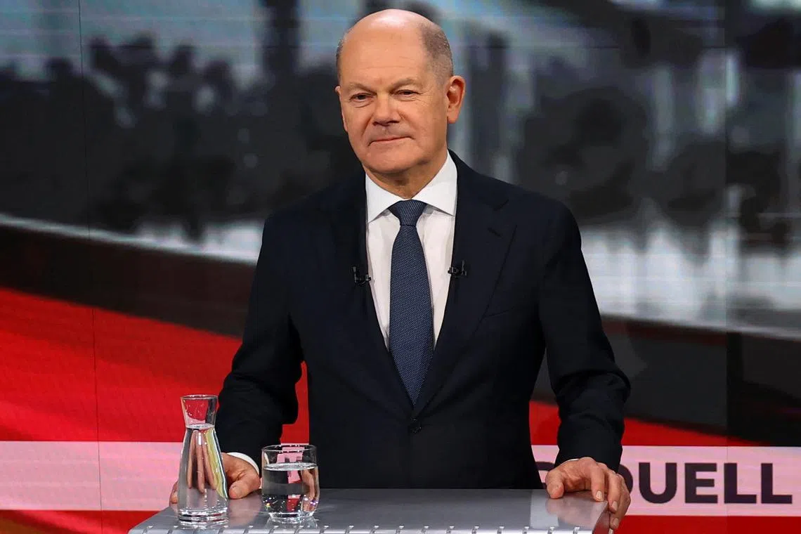 FILE PHOTO: German Chancellor of the Social Democratic Party (SPD), Olaf Scholz is pictured in a WELT TV studio ahead of a TV debate between Scholz and his conservative rival of the Christian Democratic Union (CDU) Friedrich Merz , in Berlin, Germany, February 19, 2025. REUTERS/Fabrizio Bensch/Pool/File Photo