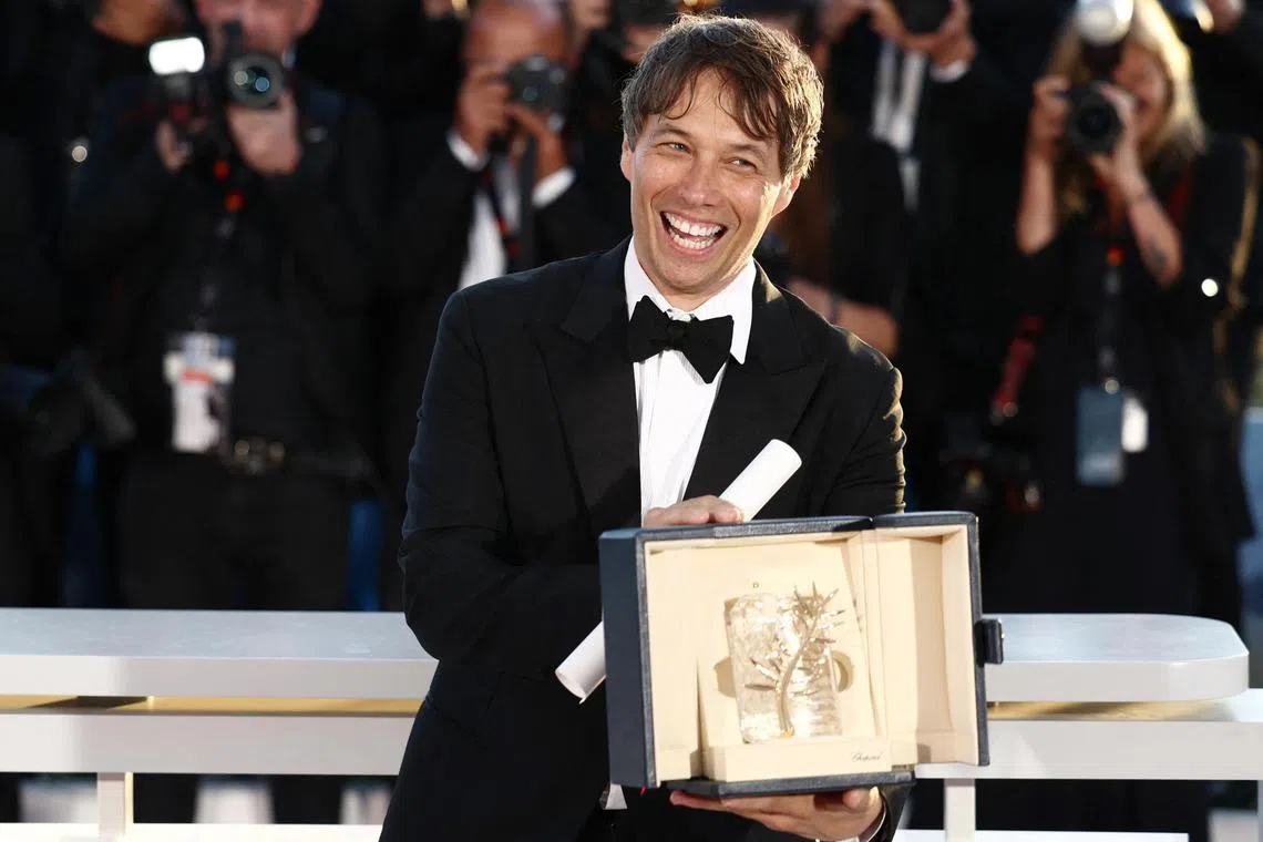 Director Sean Baker with his Palme d’Or for Anora, a film about a New York erotic dancer.